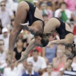 Italy's Tania Cagnotto, front, and Francesca Dallape make an attempt as they are to win the gold medal during the Women's 3m springboard synchronized diving final at the Swimming European Championships in Budapest, Hungary, Sunday, Aug. 15, 2010. (AP Photo/Michael Sohn)